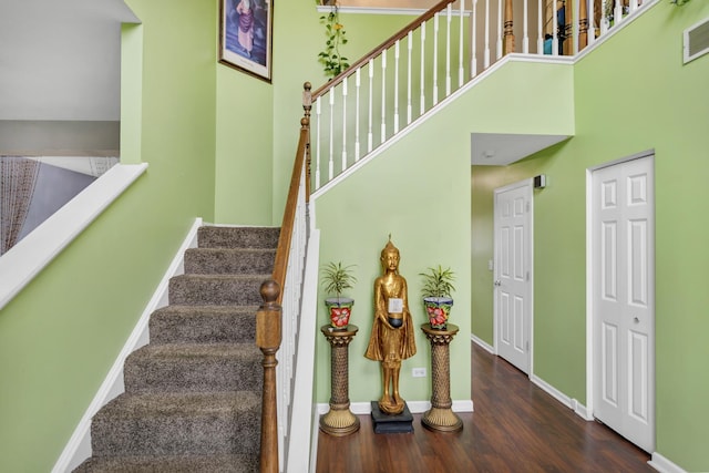 22600 W Reserve Cir, Plainfield, IL 60544 - stairs featuring wood finished floors and a towering ceiling