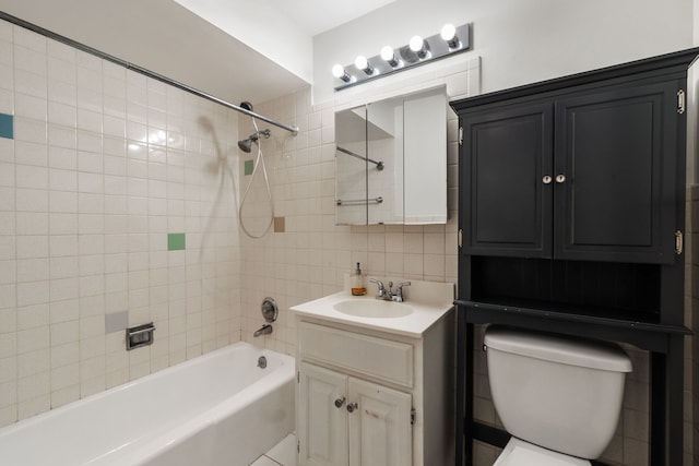 950 Washington Blvd Unit 206, Oak Park, IL 60302 - full bathroom with vanity, washtub / shower combination, tile walls, and backsplash