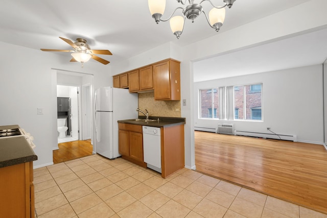 950 Washington Blvd Unit 206, Oak Park, IL 60302 - kitchen featuring white appliances, baseboard heating, dark countertops, a baseboard radiator, and a chandelier