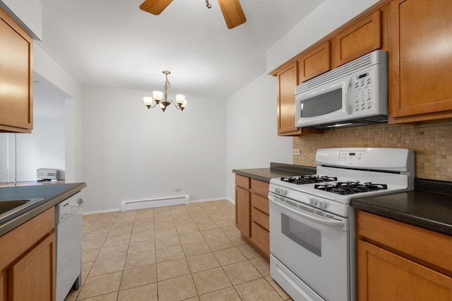 950 Washington Blvd Unit 206, Oak Park, IL 60302 - kitchen with white appliances, baseboard heating, dark countertops, and decorative backsplash