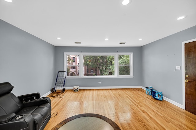 5567 W Gladys Ave, Chicago, IL 60644 - sitting room featuring wood-type flooring and recessed lighting