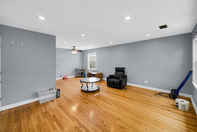 5567 W Gladys Ave, Chicago, IL 60644 - living area with light wood-type flooring, a ceiling fan, and recessed lighting