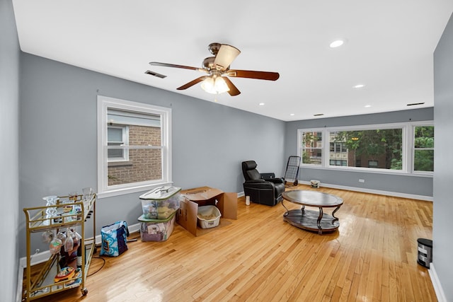 5567 W Gladys Ave, Chicago, IL 60644 - living area featuring wood-type flooring, ceiling fan, and recessed lighting