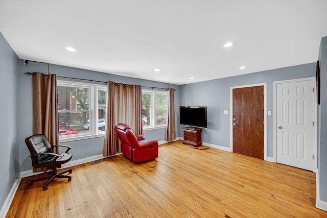 5567 W Gladys Ave, Chicago, IL 60644 - sitting room featuring light wood-style floors and recessed lighting