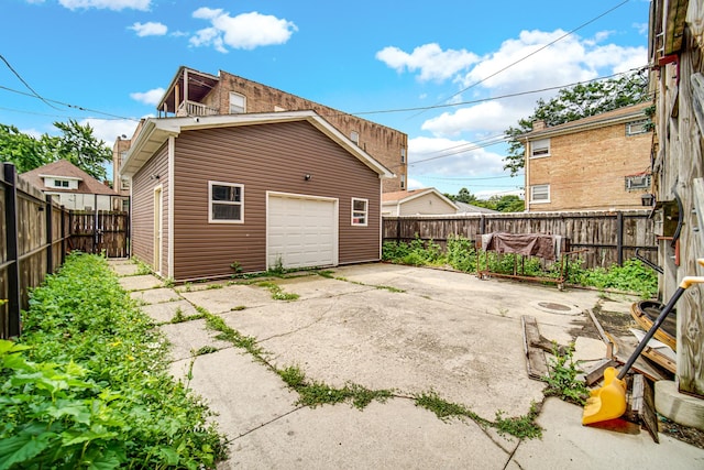 5567 W Gladys Ave, Chicago, IL 60644 - garage with driveway