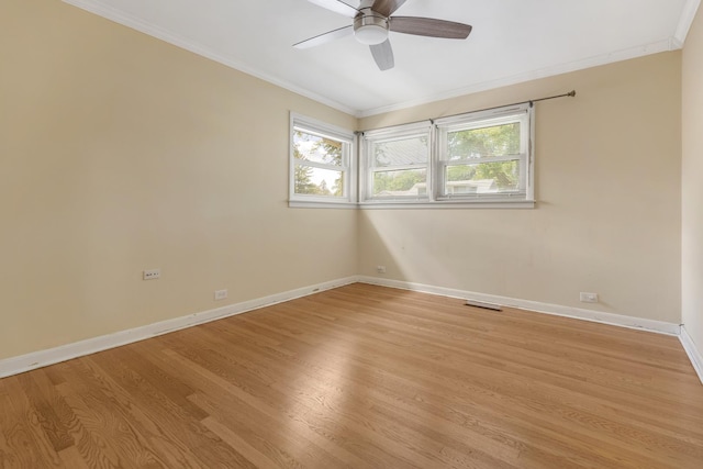 323 S Prindle Ave, Arlington Heights, IL 60004 - unfurnished room featuring crown molding, light wood finished floors, and ceiling fan