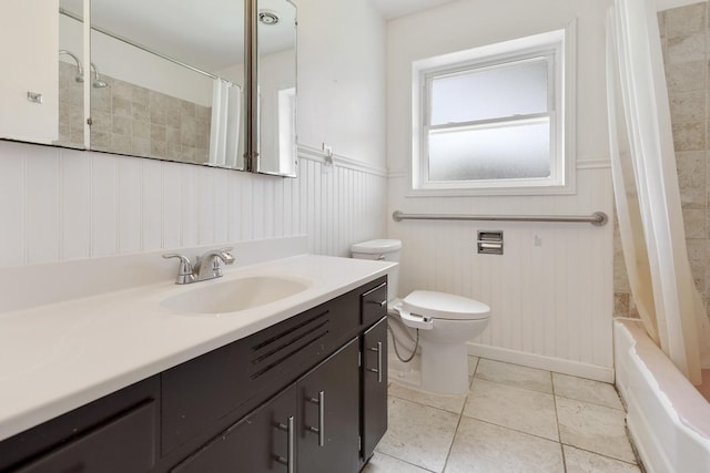 323 S Prindle Ave, Arlington Heights, IL 60004 - bathroom with vanity, tile patterned floors, a wainscoted wall, and shower / bath combo with shower curtain