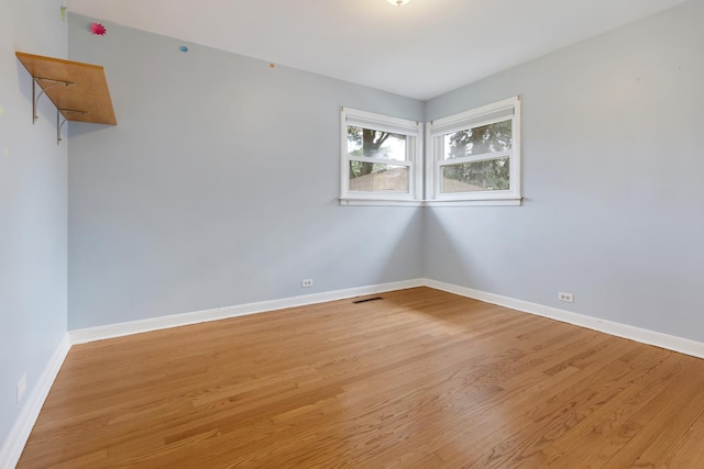 323 S Prindle Ave, Arlington Heights, IL 60004 - empty room featuring light wood-style flooring and baseboards