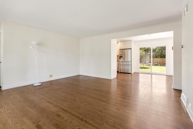 323 S Prindle Ave, Arlington Heights, IL 60004 - spare room featuring dark wood-type flooring and baseboards