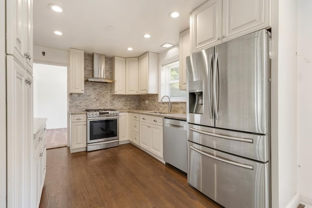 323 S Prindle Ave, Arlington Heights, IL 60004 - kitchen featuring stainless steel appliances, wall chimney range hood, dark wood-style flooring, backsplash, and light stone countertops