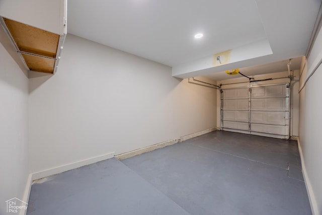 21 Elm Ct Unit 3, Bolingbrook, IL 60440 - garage featuring baseboards and a garage door opener