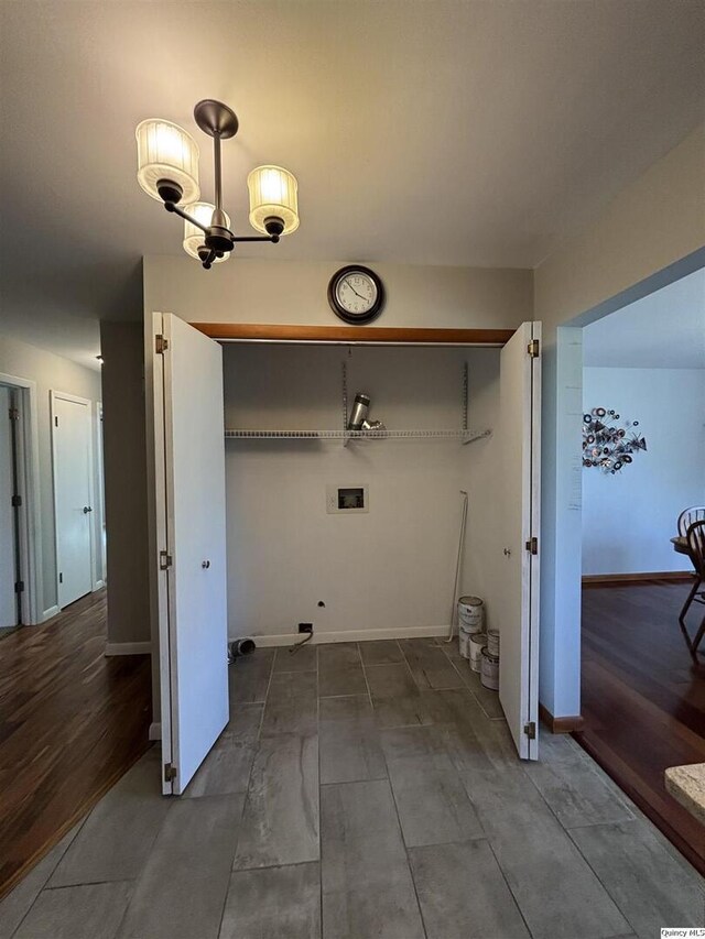 802 W Main St, La Harpe, IL 61450 - laundry area featuring baseboards and hookup for a washing machine
