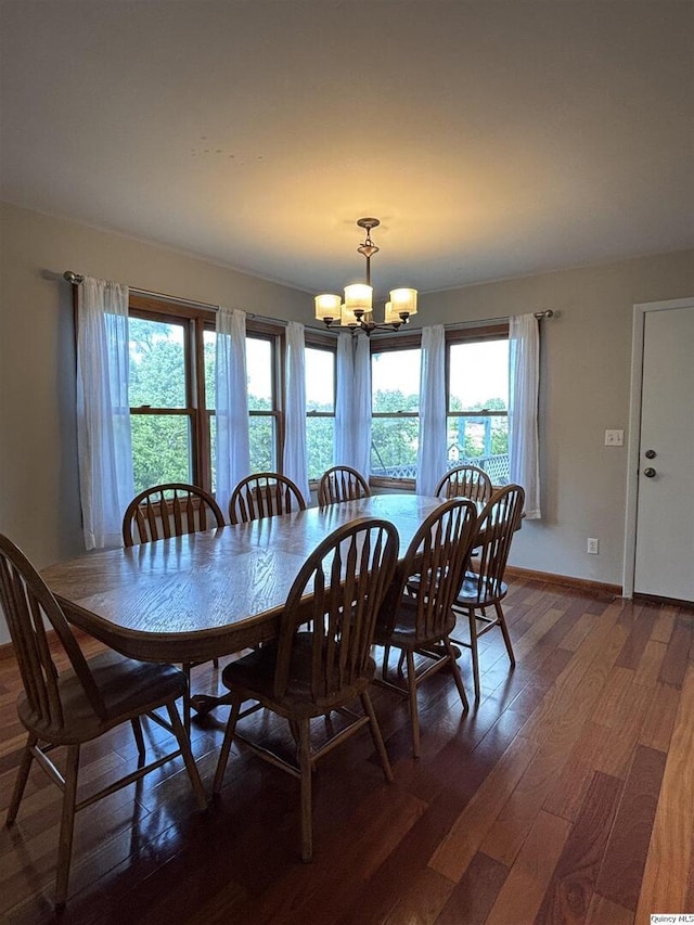 802 W Main St, La Harpe, IL 61450 - dining area featuring a chandelier and wood finished floors