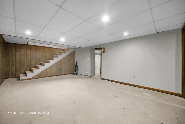 506 S 5th St, Malta, IL 60150 - finished basement featuring stairway, wooden walls, a drop ceiling, and recessed lighting