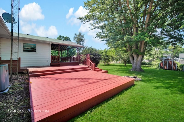 506 S 5th St, Malta, IL 60150 - wooden terrace featuring a lawn