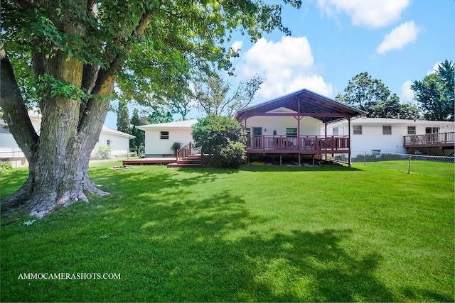506 S 5th St, Malta, IL 60150 - back of house with a wooden deck