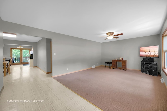 506 S 5th St, Malta, IL 60150 - unfurnished room featuring ceiling fan and a chandelier