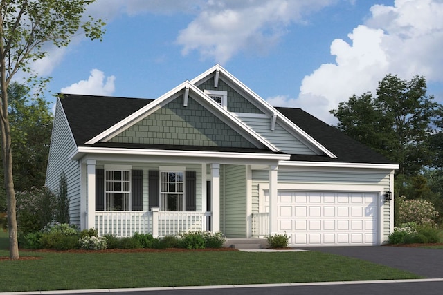 1638 Patterson Ave, North Aurora, IL 60542 - view of front facade featuring covered porch, asphalt driveway, an attached garage, and a front yard