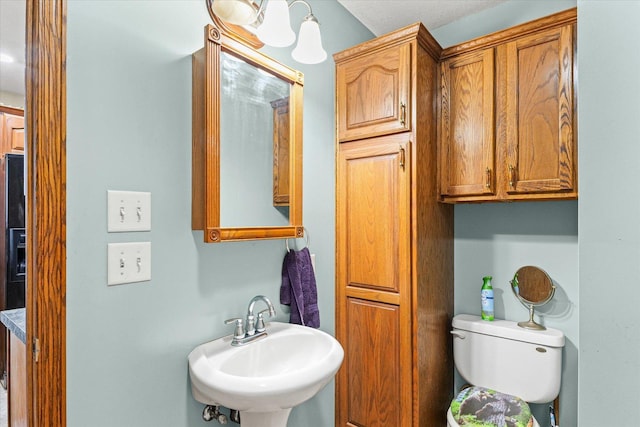 519 S 4th St, Fairbury, IL 61739 - bathroom with a sink and toilet