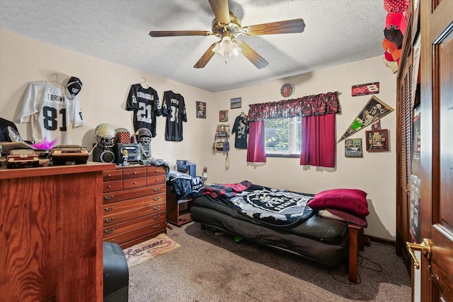519 S 4th St, Fairbury, IL 61739 - carpeted bedroom with a textured ceiling and ceiling fan