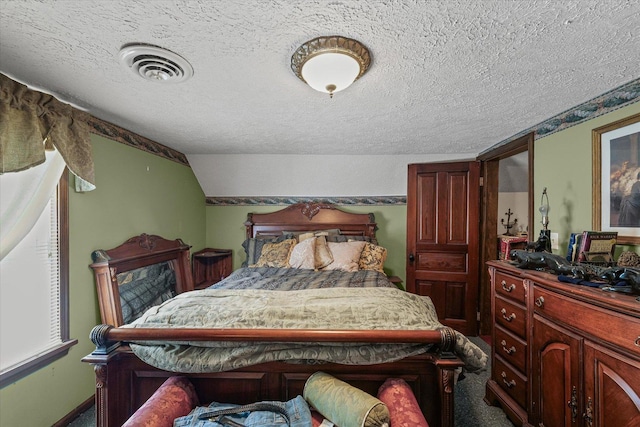 519 S 4th St, Fairbury, IL 61739 - bedroom featuring a textured ceiling and lofted ceiling