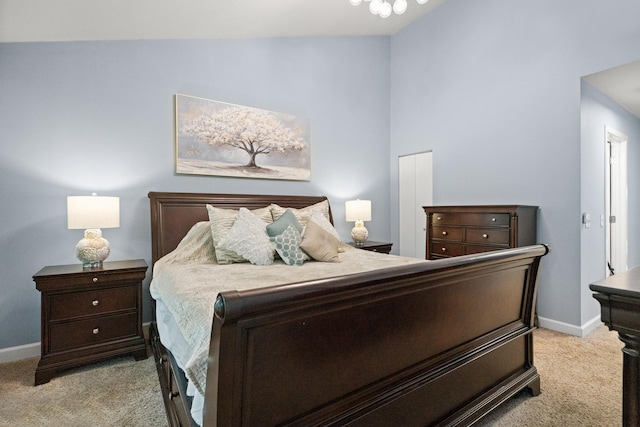 1801 W Diversey Pkwy Unit 36, Chicago, IL 60614 - bedroom with light carpet, vaulted ceiling, and a closet