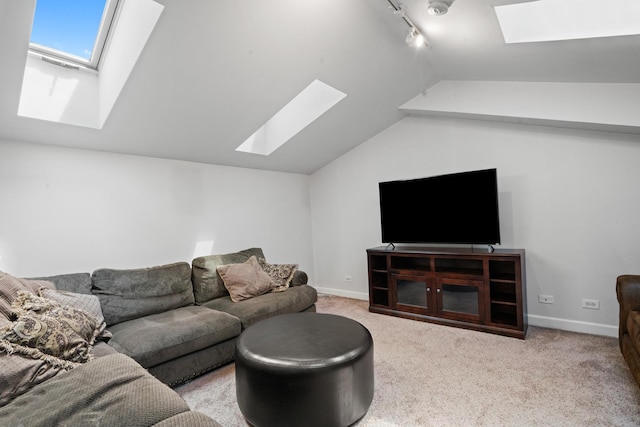 1801 W Diversey Pkwy Unit 36, Chicago, IL 60614 - carpeted living room featuring a skylight, lofted ceiling, and track lighting