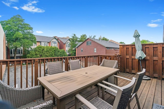 1801 W Diversey Pkwy Unit 36, Chicago, IL 60614 - deck with outdoor dining area and a residential view