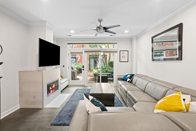 1801 W Diversey Pkwy Unit 36, Chicago, IL 60614 - living area featuring ornamental molding, wood finished floors, recessed lighting, ceiling fan, and a tile fireplace