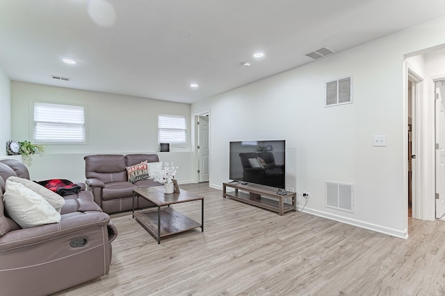 7559 Kingsbury Dr, Hanover Park, IL 60133 - living area featuring wood finished floors and recessed lighting