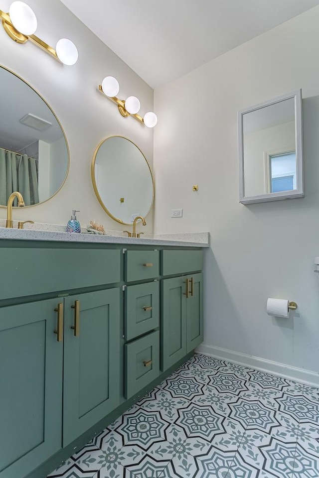 7559 Kingsbury Dr, Hanover Park, IL 60133 - bathroom with double vanity and tile patterned floors