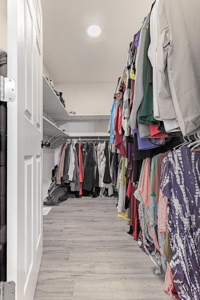 7559 Kingsbury Dr, Hanover Park, IL 60133 - spacious closet with wood finished floors