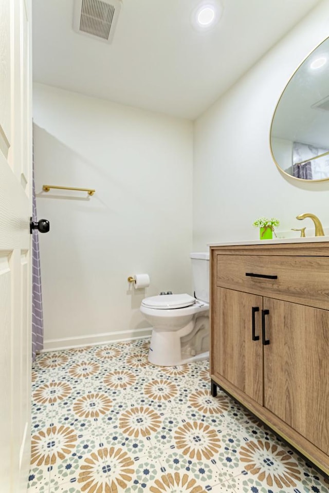 7559 Kingsbury Dr, Hanover Park, IL 60133 - bathroom featuring vanity and tile patterned floors