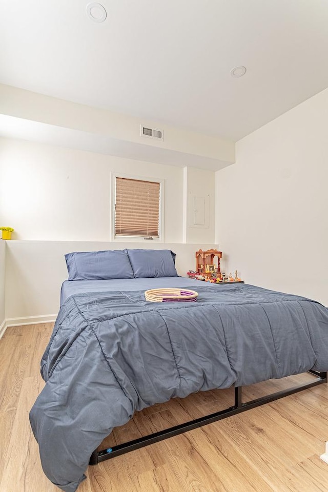 7559 Kingsbury Dr, Hanover Park, IL 60133 - bedroom featuring wood finished floors and baseboards