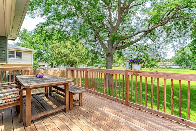 7559 Kingsbury Dr, Hanover Park, IL 60133 - wooden deck with outdoor dining space and a fenced backyard