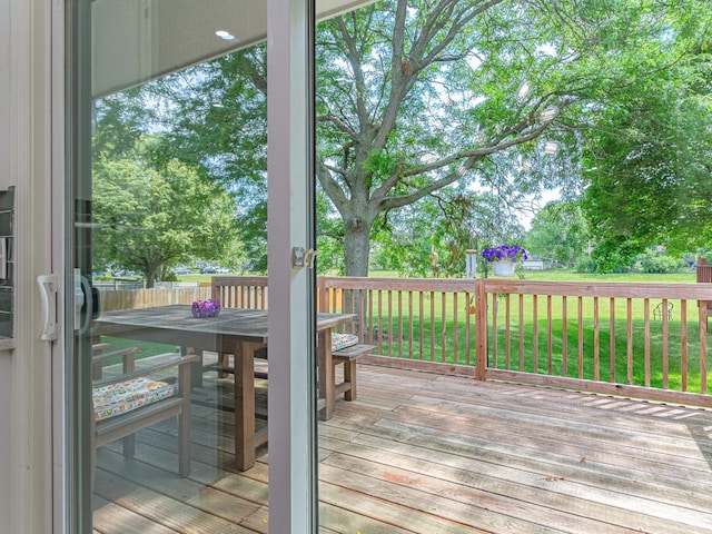 7559 Kingsbury Dr, Hanover Park, IL 60133 - deck featuring outdoor dining space and a lawn