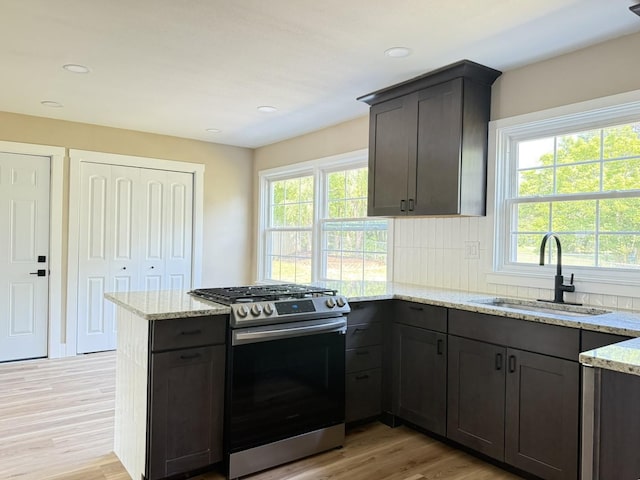 3814 Abbotsford Rd, Rockford, IL 61107 - kitchen with gas stove, light wood-type flooring, healthy amount of natural light, a peninsula, and recessed lighting