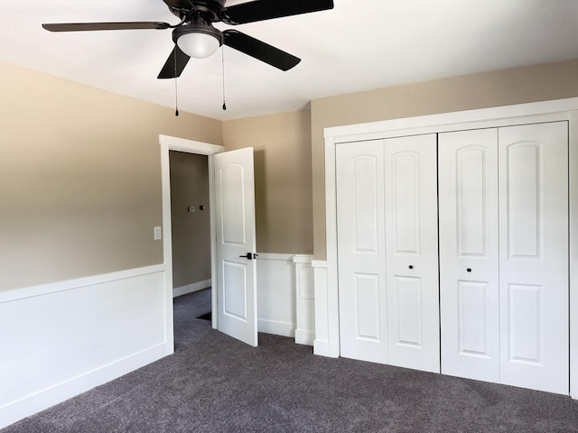 3814 Abbotsford Rd, Rockford, IL 61107 - unfurnished bedroom featuring dark colored carpet, a closet, and a ceiling fan