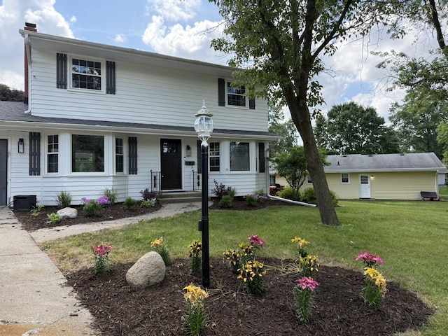 3814 Abbotsford Rd, Rockford, IL 61107 - traditional-style home featuring a front yard