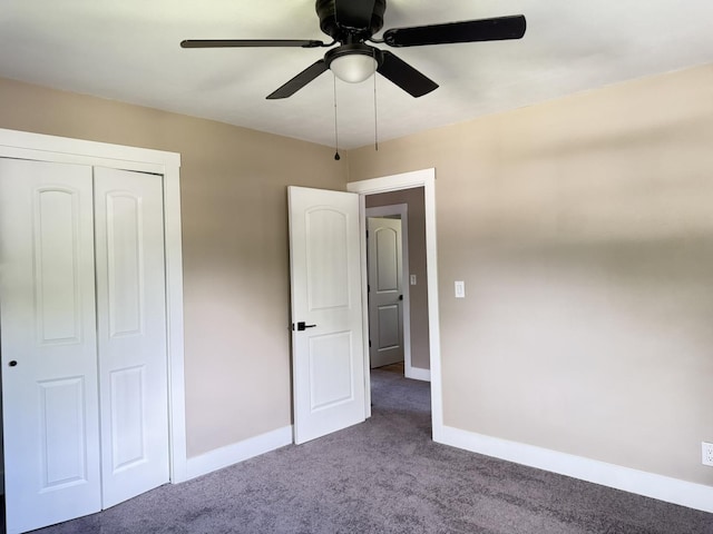 3814 Abbotsford Rd, Rockford, IL 61107 - unfurnished bedroom with dark carpet, a closet, and ceiling fan