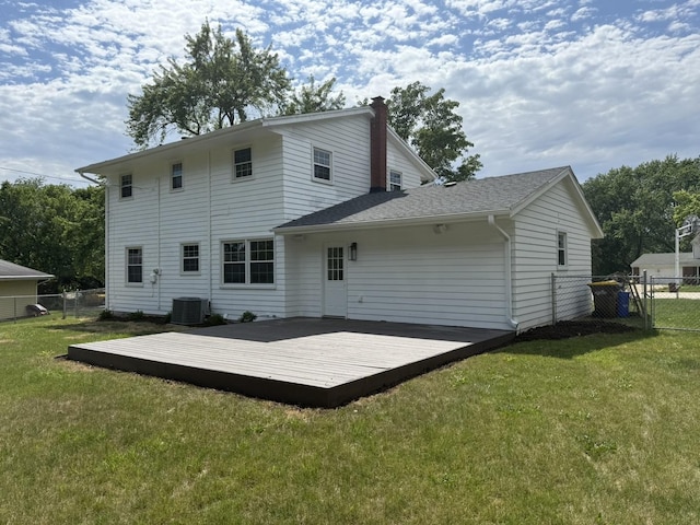 3814 Abbotsford Rd, Rockford, IL 61107 - back of property featuring a wooden deck and a chimney