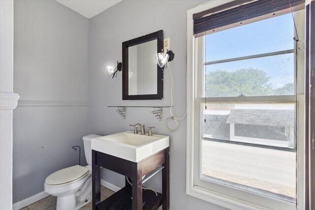1304 E 4th St, Sterling, IL 61081 - half bathroom with toilet and vanity