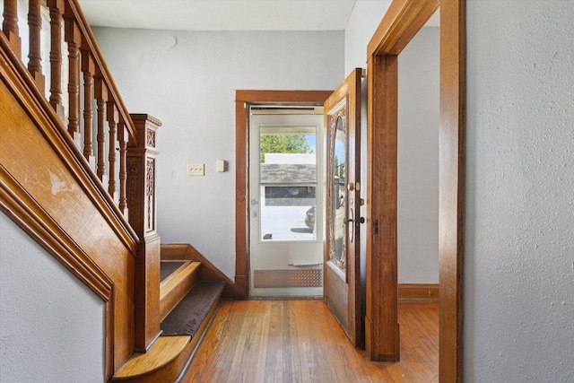 1304 E 4th St, Sterling, IL 61081 - foyer featuring wood-type flooring and stairs