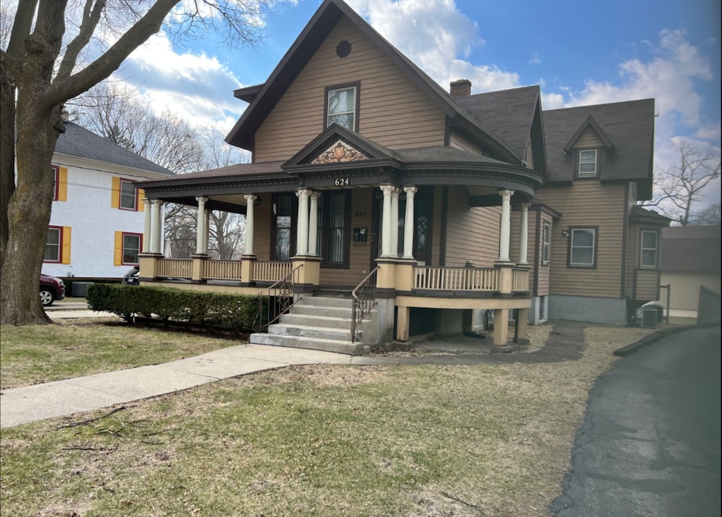 624 S St, Elgin, IL 60123 - victorian-style house featuring a porch, a chimney, and a front yard