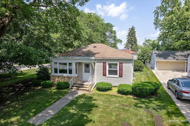 393 Lakelawn Blvd, Aurora, IL 60506 - bungalow-style house with a front yard and a shingled roof