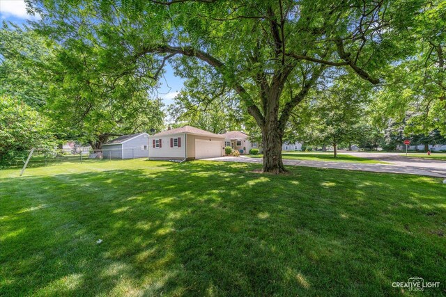 393 Lakelawn Blvd, Aurora, IL 60506 - view of yard with concrete driveway