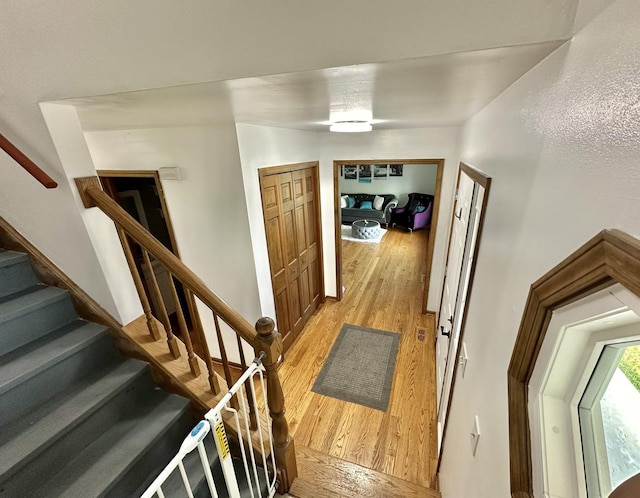 1970 Division St, Saint Charles, IL 60174 - entryway with light wood-style flooring and stairway