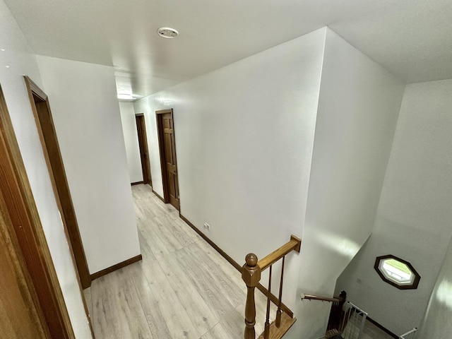1970 Division St, Saint Charles, IL 60174 - hallway with an upstairs landing and light wood finished floors