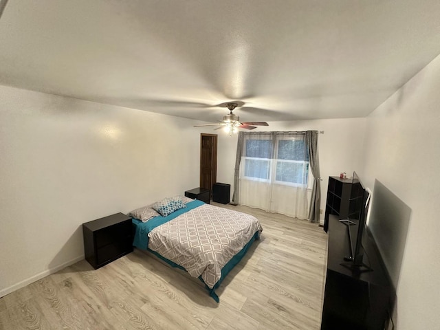 1970 Division St, Saint Charles, IL 60174 - bedroom with light wood-style floors and ceiling fan