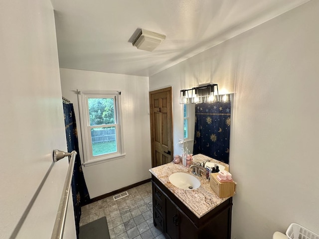 1970 Division St, Saint Charles, IL 60174 - bathroom featuring vanity and baseboards